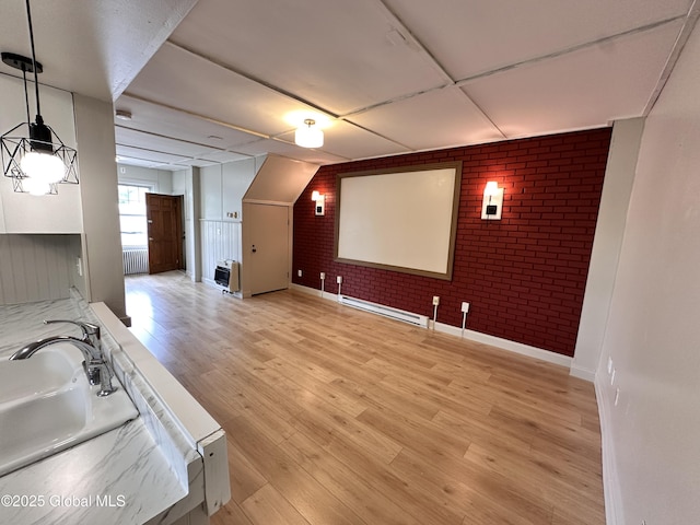 1 S Main St, Voorheesville, NY 12186 - cinema with brick wall and light wood-style flooring