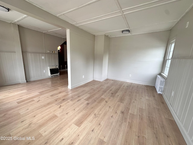 1 S Main St, Voorheesville, NY 12186 - unfurnished room with heating unit, radiator heating unit, and light wood-style floors