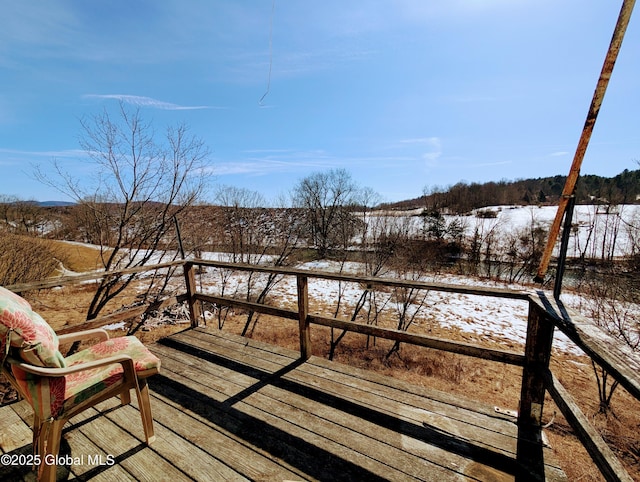 view of snow covered deck