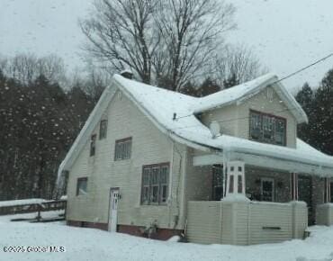 view of snow covered property