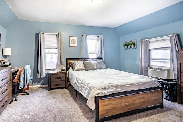 carpeted bedroom featuring vaulted ceiling, cooling unit, and baseboards