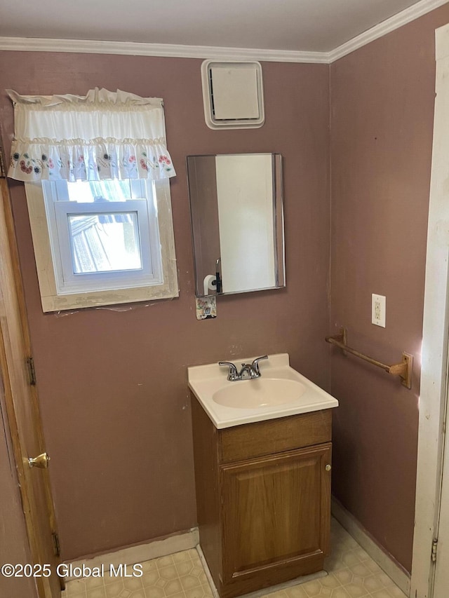 bathroom with vanity, tile patterned floors, and ornamental molding