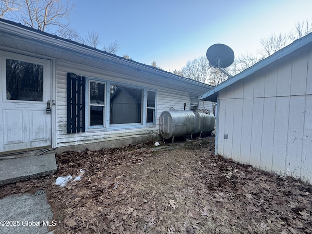 view of home's exterior with heating fuel