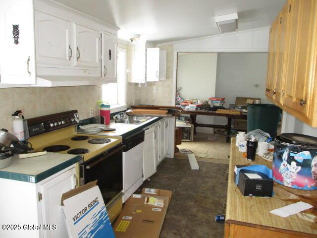 kitchen featuring electric range, white cabinetry, light countertops, and white dishwasher