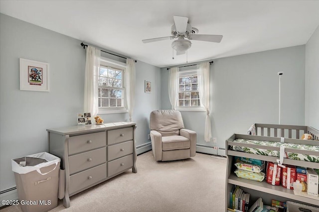 bedroom featuring a ceiling fan, light colored carpet, and a baseboard radiator