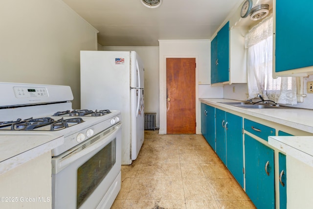 kitchen featuring blue cabinetry, radiator heating unit, light countertops, white range with gas cooktop, and a sink