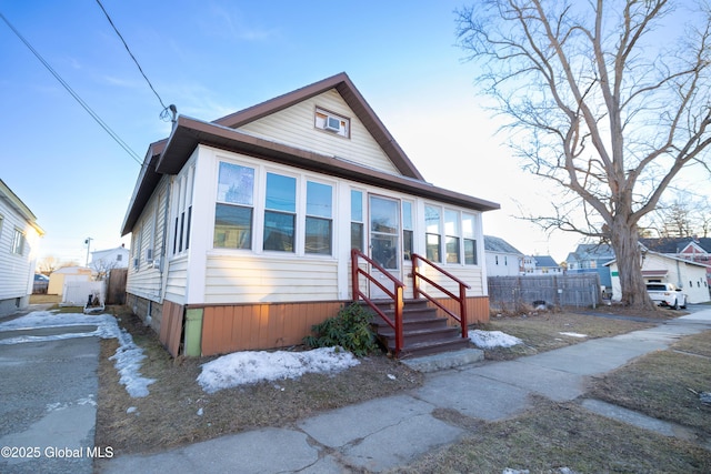 view of front of home with fence