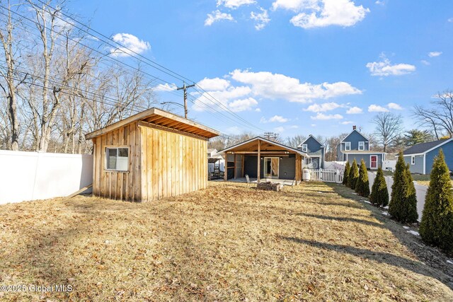 view of shed with a fenced backyard