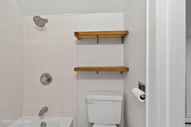 bathroom with toilet and shower / bath combination