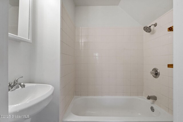 full bathroom featuring a sink and shower / bath combination