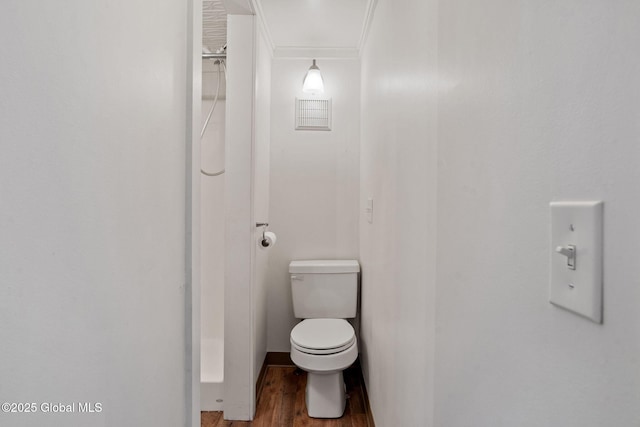 bathroom featuring toilet and wood finished floors