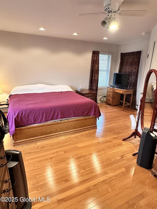 bedroom with recessed lighting, light wood-type flooring, and a ceiling fan