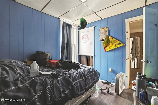 bedroom featuring wood finished floors