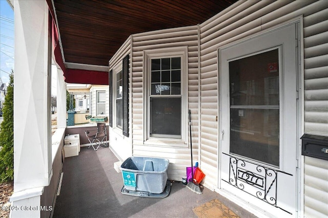 view of patio featuring a porch and grilling area