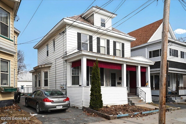 traditional style home with covered porch