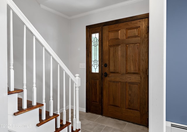 foyer with light tile patterned floors, a baseboard radiator, ornamental molding, and stairway