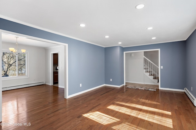 unfurnished living room with crown molding, stairs, baseboard heating, wood finished floors, and a notable chandelier