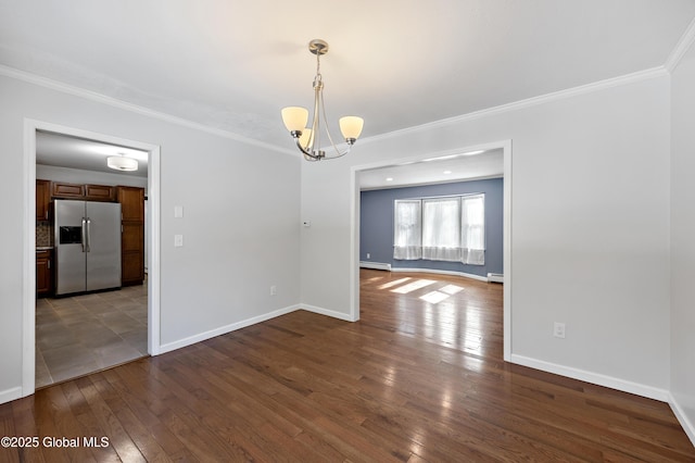 unfurnished room featuring dark wood-type flooring, crown molding, baseboards, baseboard heating, and a chandelier