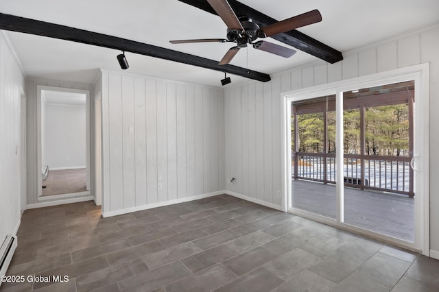 spare room with beamed ceiling, ceiling fan, a baseboard heating unit, and baseboards