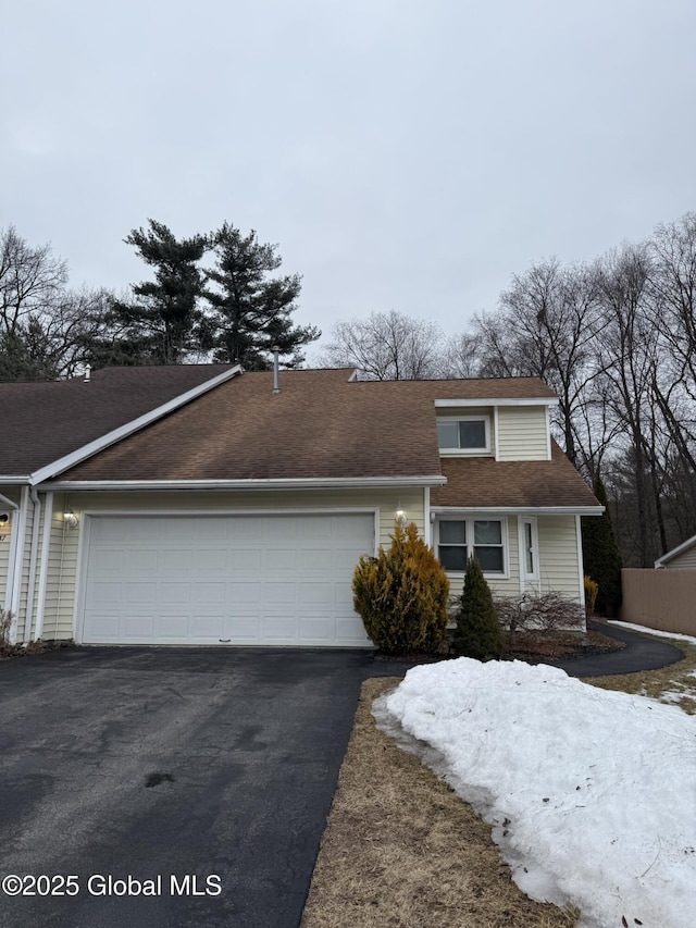 view of front of house featuring a garage and driveway