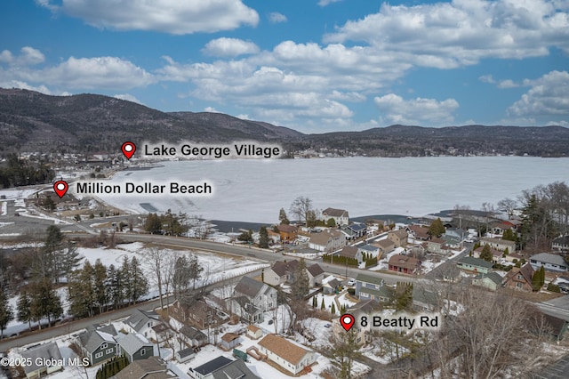 property view of water with a residential view and a mountain view