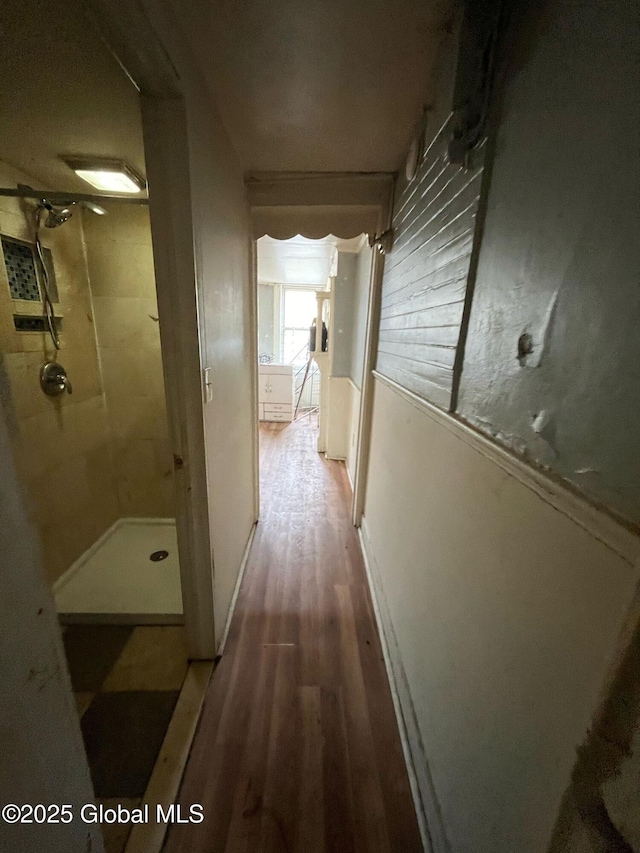 hallway featuring wood finished floors