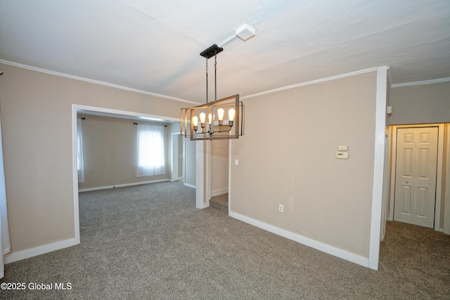 carpeted spare room featuring baseboards, an inviting chandelier, and crown molding