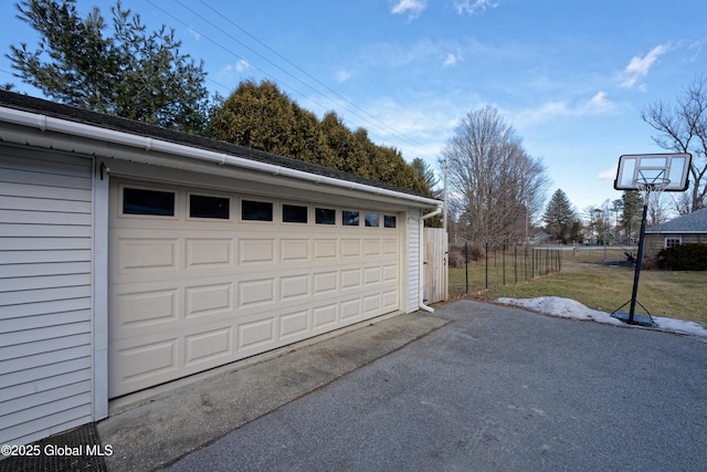 detached garage with fence