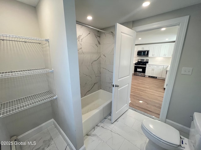 full bath with recessed lighting, toilet, baseboards, and marble finish floor