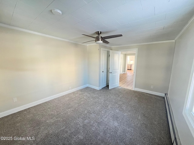 unfurnished bedroom featuring a baseboard heating unit, baseboards, crown molding, carpet, and a ceiling fan