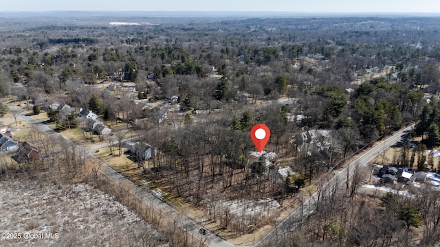 drone / aerial view with a forest view