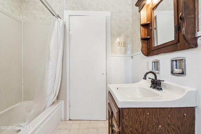 full bathroom featuring vanity and shower / bath combination with curtain