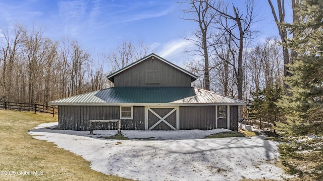 exterior space with a yard and fence