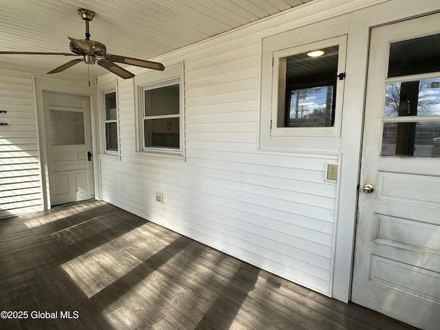 exterior space featuring a ceiling fan