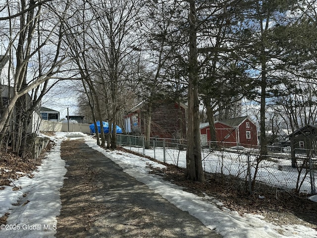 view of street featuring a barn