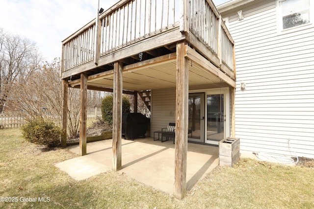 view of patio featuring a grill and a wooden deck