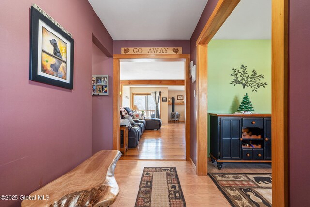 hallway with wood finished floors