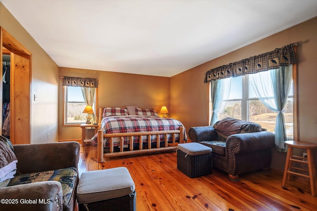 bedroom featuring wood-type flooring