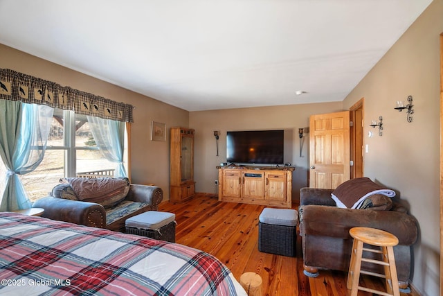 bedroom featuring light wood-style floors