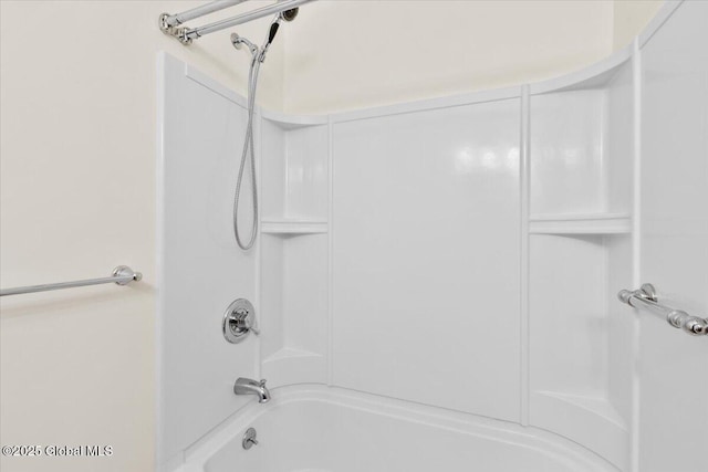 bathroom featuring washtub / shower combination