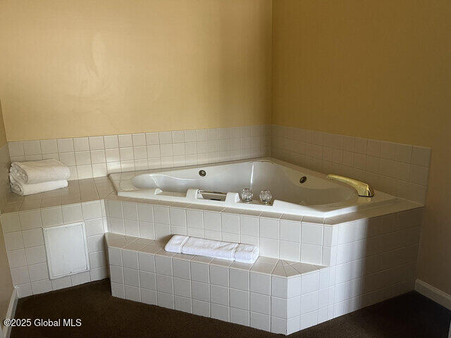 bathroom with a bath