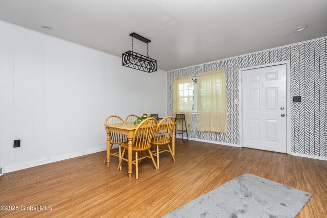68 Wemple Rd, Bethlehem, NY 12054 - dining room featuring wood finished floors, baseboards, and wallpapered walls