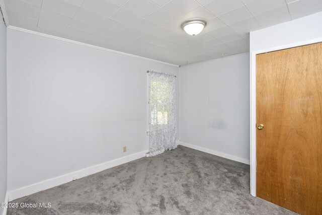 68 Wemple Rd, Bethlehem, NY 12054 - spare room featuring carpet flooring, ornamental molding, and baseboards