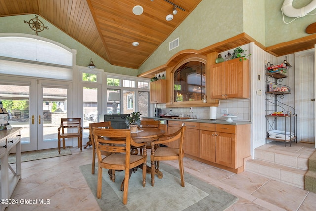 dining area with french doors, high vaulted ceiling, wooden ceiling, and rail lighting