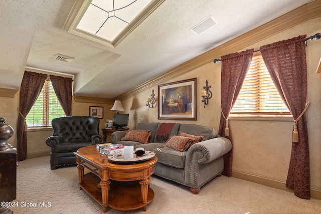 carpeted living room with visible vents, a textured ceiling, crown molding, and baseboards