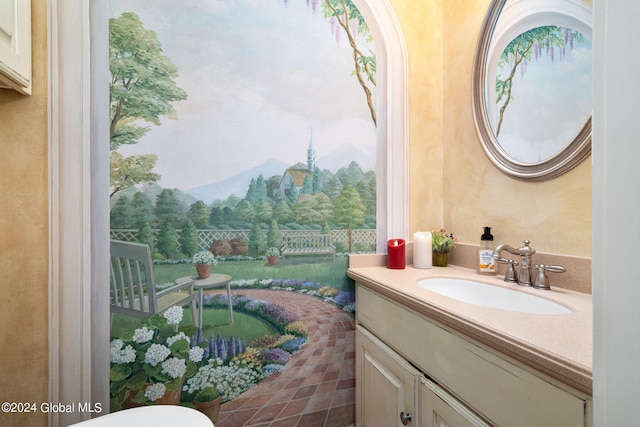 bathroom with a mountain view and vanity