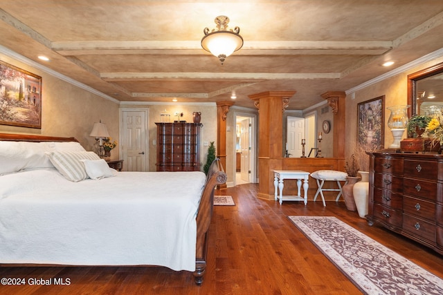 bedroom with crown molding, beamed ceiling, wood finished floors, and ornate columns