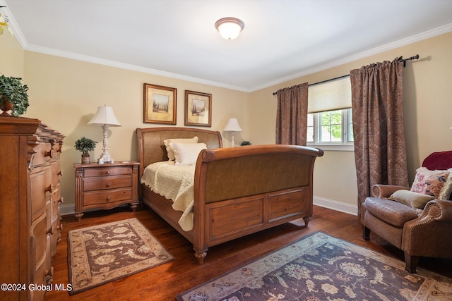 bedroom with baseboards, dark wood-style flooring, and crown molding