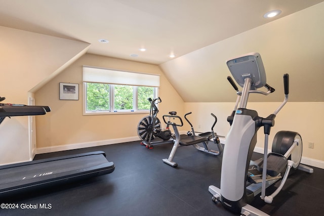 workout area with recessed lighting, baseboards, and vaulted ceiling