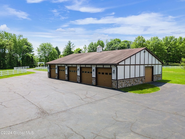 detached garage with fence